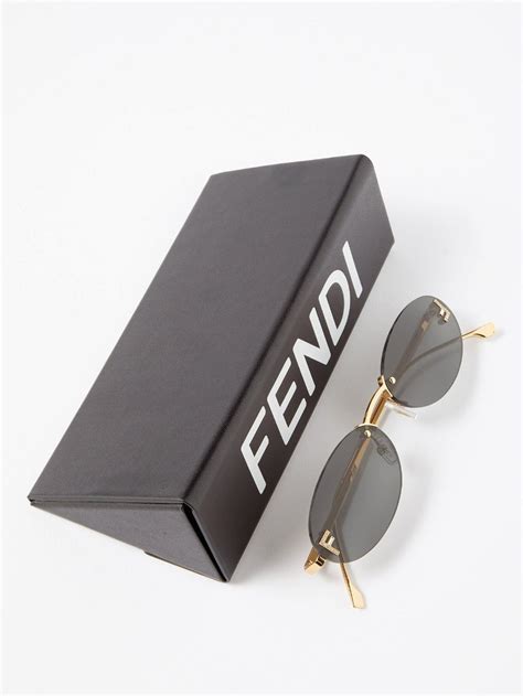 fendi eyewear rimless round metal sunglasses|fendi unisex sunglasses.